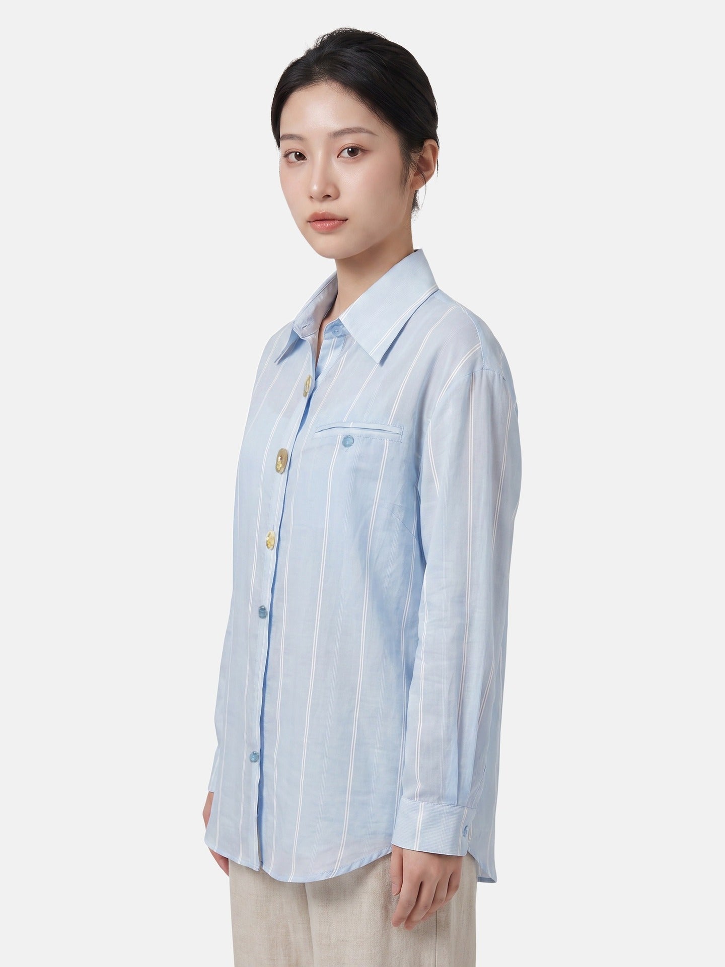 Blusa in 70% Tencel 20% Poliammide 10% Poliester Blu