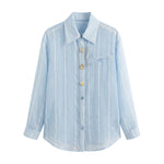 Blusa in 70% Tencel 20% Poliammide 10% Poliester Blu