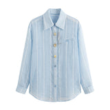 Blusa in 70% Tencel 20% Poliammide 10% Poliester Blu