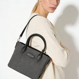 Bolso de mano de piel vegana negra