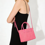 Fuchsiafarbene Handtasche aus veganem Leder
